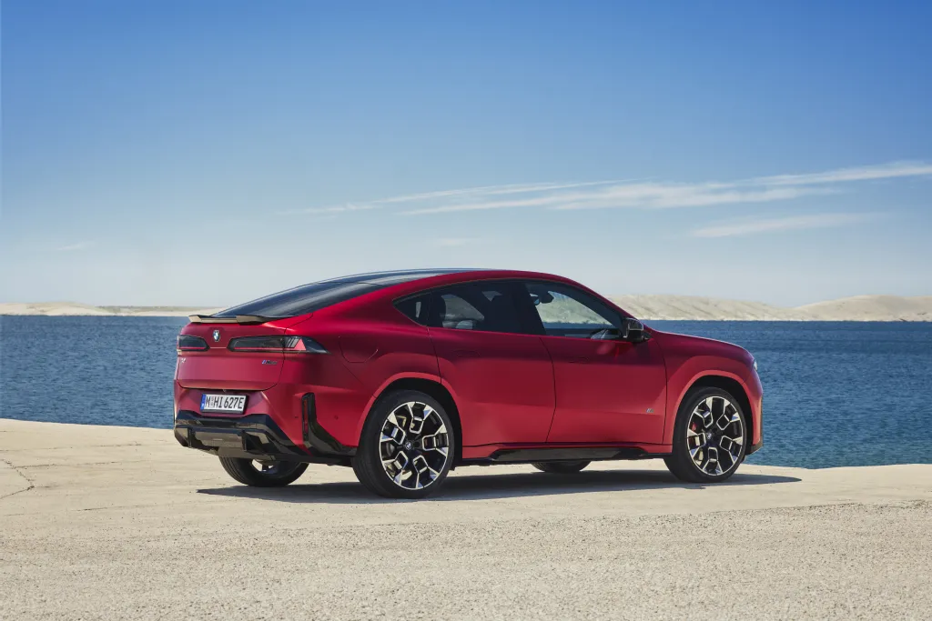 Новый BMW iX4: электрический кроссовер с покатой крышей и зарядкой до 400 кВт — фото 20